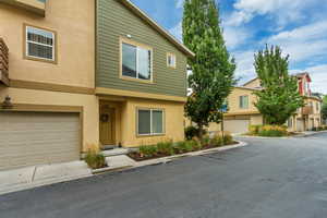 View of front of house featuring stucco siding