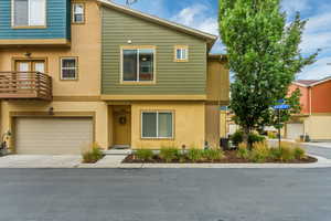 View of front of house featuring stucco siding