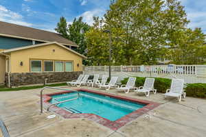 View of swimming pool featuring a patio area and a pool