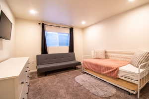 Bedroom with carpet and recessed lighting