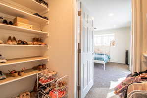 Interior space featuring baseboards and recessed lighting