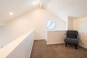 Unfurnished room featuring carpet, recessed lighting, and an upstairs landing