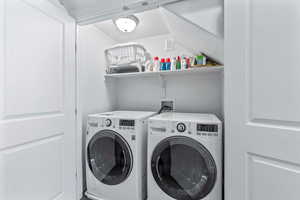 Laundry room with separate washer and dryer