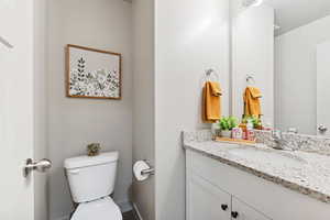 Bathroom with vanity and toilet