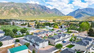 Aerial view of residential area featuring a mountain backdrop