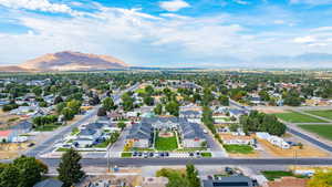 Aerial perspective of suburban area featuring mountains