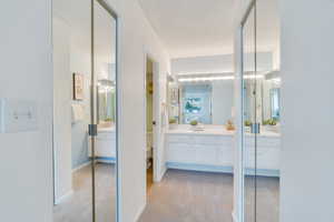 Bathroom featuring vanity and a textured ceiling
