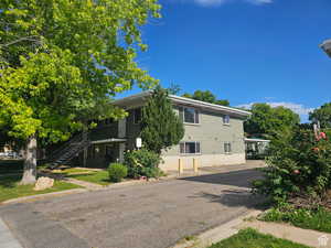View of front of house featuring stairs