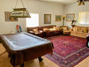 Playroom featuring billiards table and ceiling fan