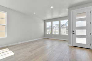 Entryway featuring recessed lighting and light wood-style flooring