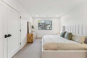 Bedroom featuring carpet floors and recessed lighting