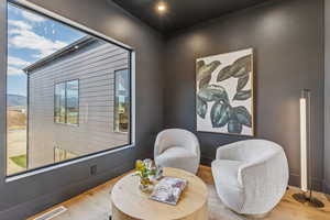 Living area with wood finished floors