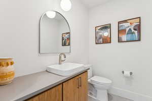 Bathroom with vanity and toilet