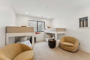 Bedroom with carpet flooring and recessed lighting