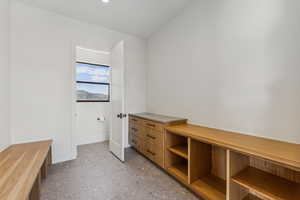 Mudroom featuring baseboards and recessed lighting