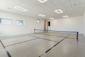 View of property's community featuring a drop ceiling