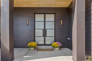 Property entrance with french doors