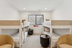 Bedroom featuring carpet flooring and recessed lighting