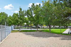 View of home's community featuring community basketball court