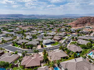 Aerial view of residential area featuring a mountain backdrop