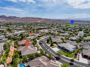 Aerial perspective of suburban area featuring mountains