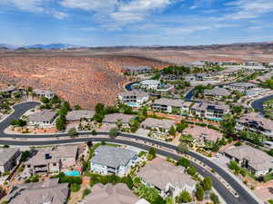Aerial view of residential area featuring a mountain backdrop