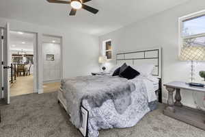 Bedroom featuring carpet and a ceiling fan