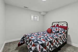 Bedroom featuring carpet floors