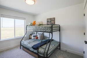 Bedroom featuring carpet floors