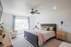 Bedroom featuring carpet floors, a ceiling fan, and recessed lighting