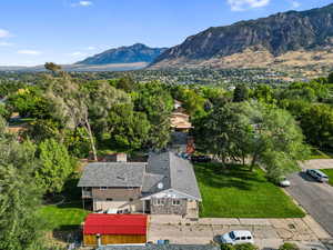 View of subject property featuring mountains
