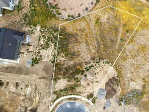 Overview of rural landscape featuring property parcel outlined and a desert landscape