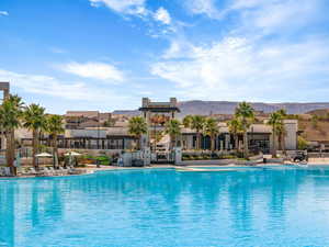 Community pool featuring a patio area and a mountain view