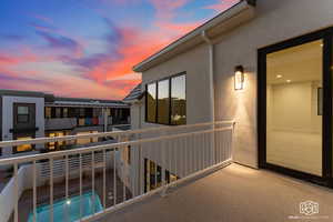Balcony with view of pool