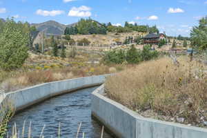 View of mountain background featuring a large body of water