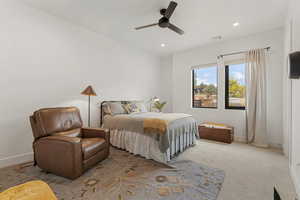 Bedroom featuring recessed lighting, a ceiling fan, and carpet floors