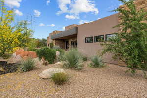View of front of house with stucco siding