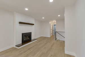 View from kitchen to gas fireplace