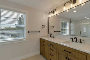 Master bathroom, includes small closet for washer/dryer