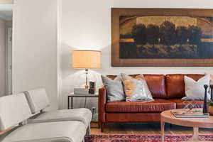 Living room featuring wood finished floors