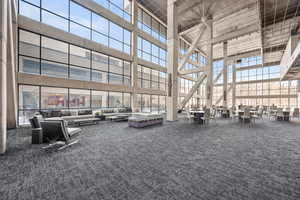 Community lobby featuring a towering ceiling