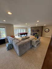 Living area with a fireplace, billiards table, carpet floors, and recessed lighting