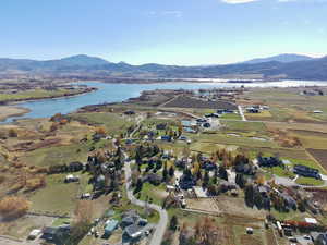 View of property location with a water and mountain view
