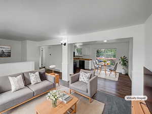 Living area with wood finished floors