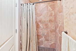 Bathroom with a stall shower