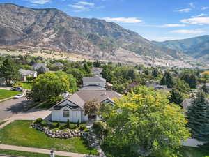 View of mountain backdrop with nearby suburban area
