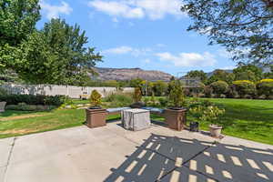 View of patio / terrace with a mountain view