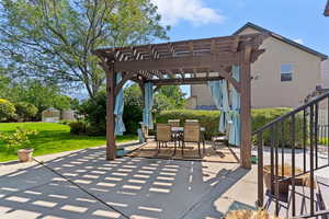 View of patio / terrace featuring outdoor dining space and a pergola