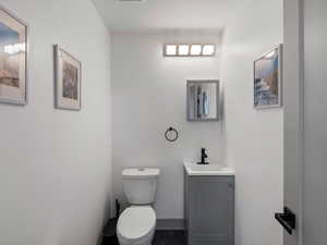 Bathroom with vanity and toilet