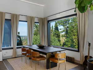 Dining space featuring wood finished floors